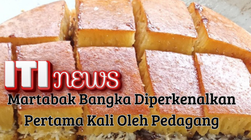 Martabak Bangka manis dengan topping kacang dan keju dipotong kotak siap disajikan.